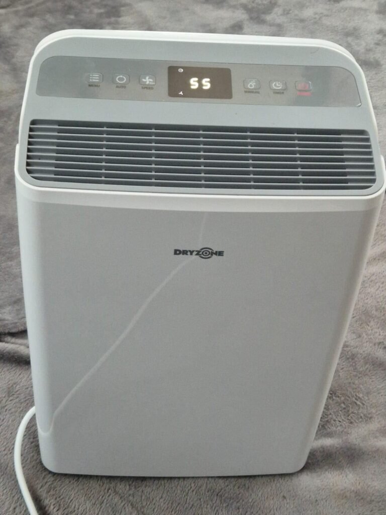view of our own new purchase testing dryzone 12l energy efficient dehumidifier uk unboxing package arrival several weeks to months